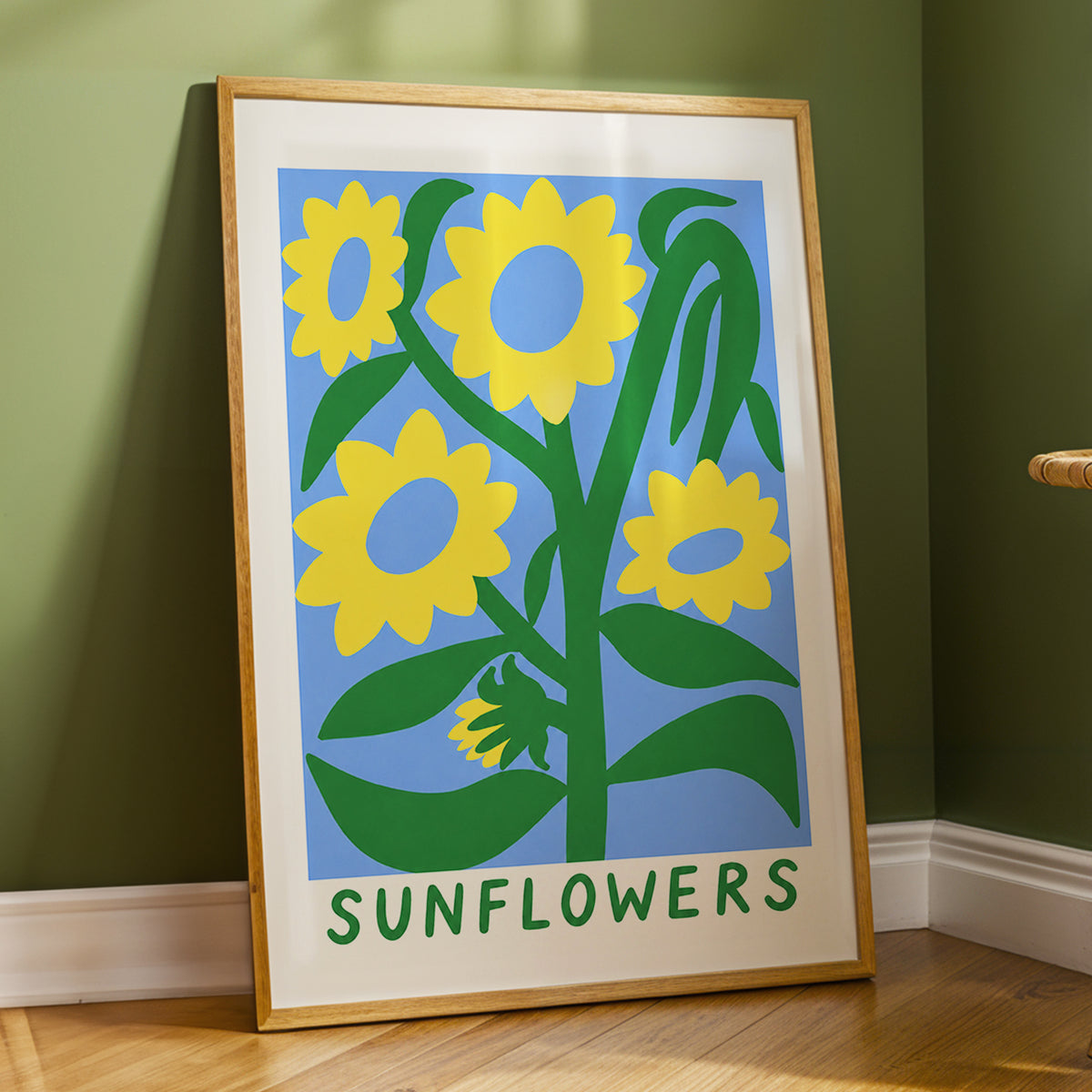 Sunflower Daydream, yellow, green, blue floral wall art displayed in a styled interior, gallery view 9