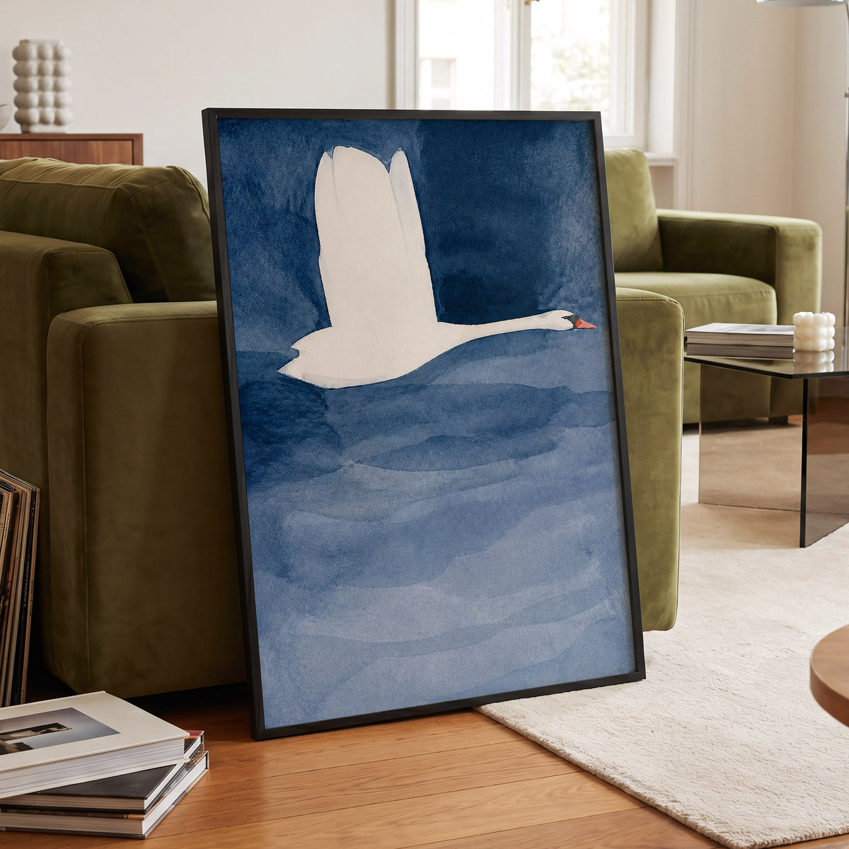 Swan in Blue Silence, blue, white, black nature wall art displayed in a styled interior, gallery view 9