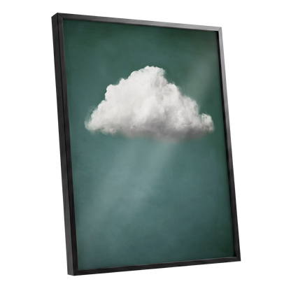 Framed wall art featuring a white cloud against a dark teal-green background with soft light rays, shown in a black frame on a white studio background.