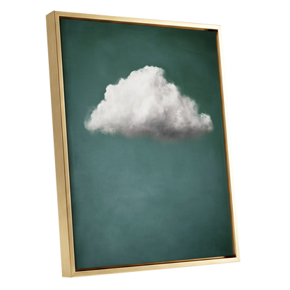 A framed wall art print featuring a single fluffy white cloud centered on a muted teal background, shown in a gold-toned frame against a plain white backdrop.