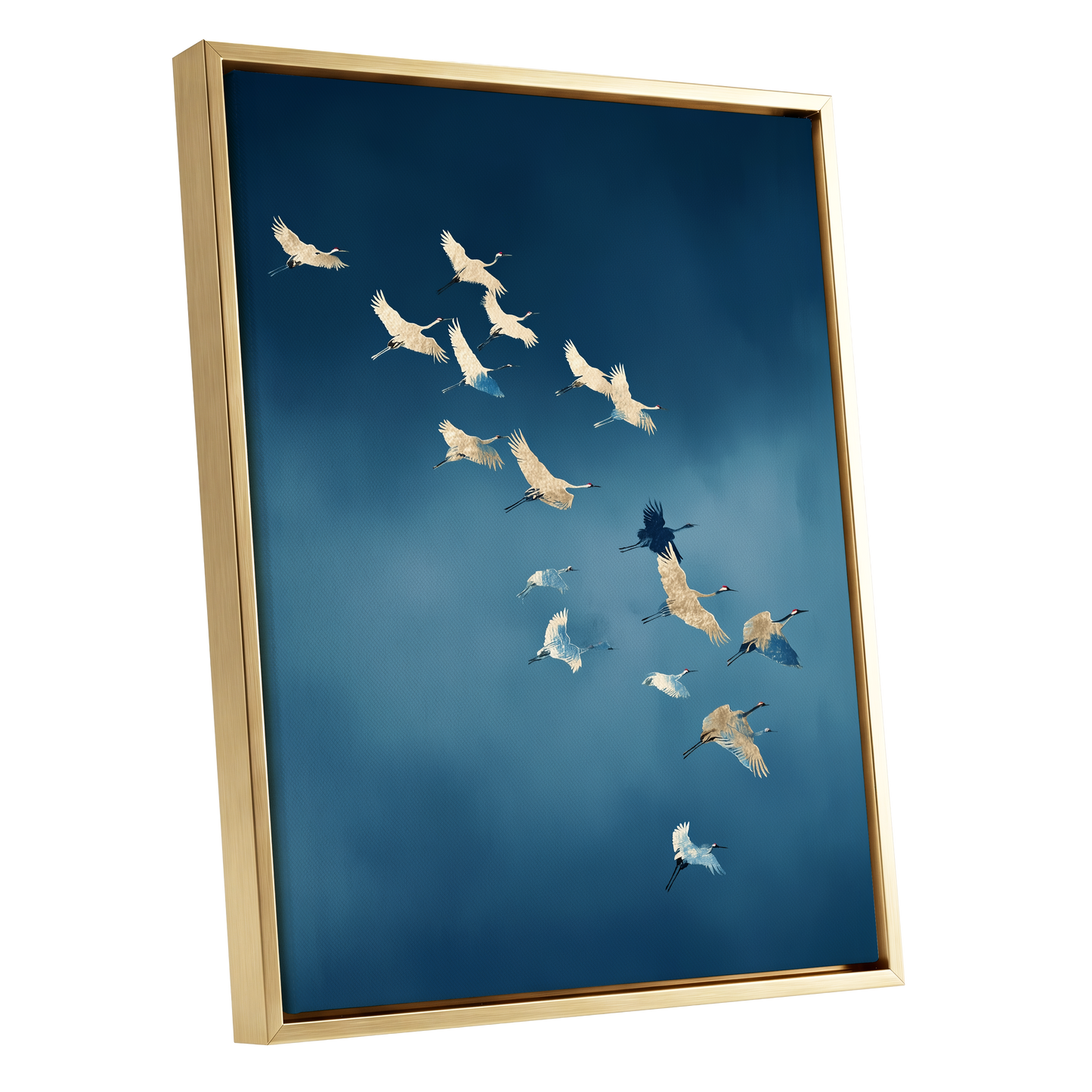 A framed wall art print showing a flock of cranes flying across a deep blue sky, presented in a gold frame against a white background.