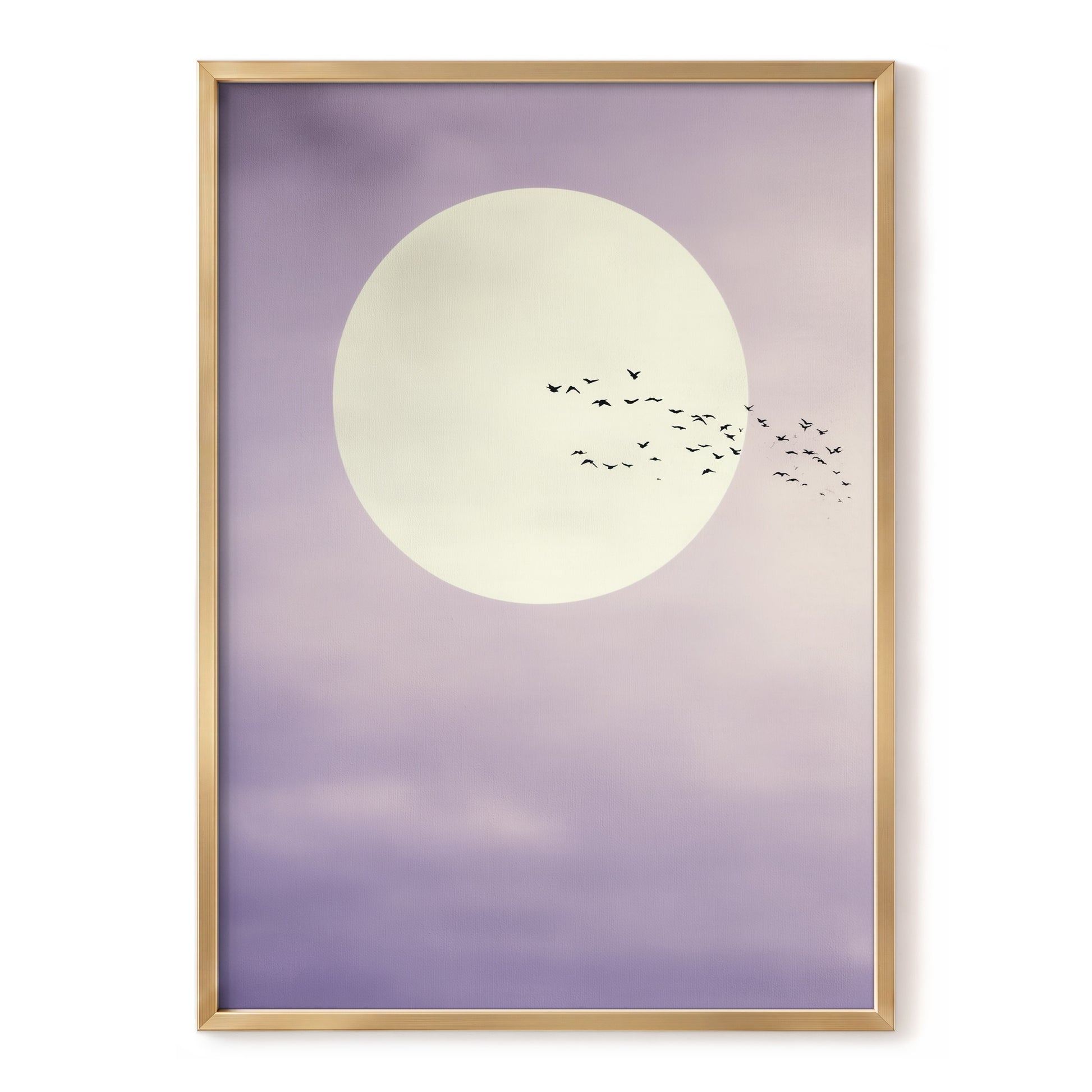 A framed art print featuring a large cream-colored moon and a flock of small black birds against a soft lavender-purple sky, enclosed in a thin gold frame.