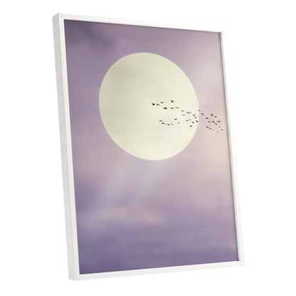 Framed wall art featuring a large cream moon against a soft lavender and purple sky with a flock of birds, shown in a white frame on a white background.