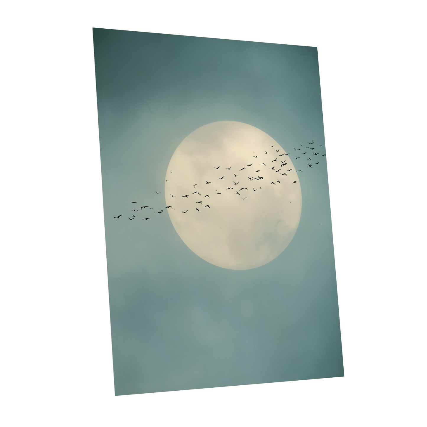 A vertical art print depicting a large cream-colored full moon against a muted teal-blue cloudy sky, with a flock of small black birds flying across the center. The print is shown at a slight angle on a solid white background.