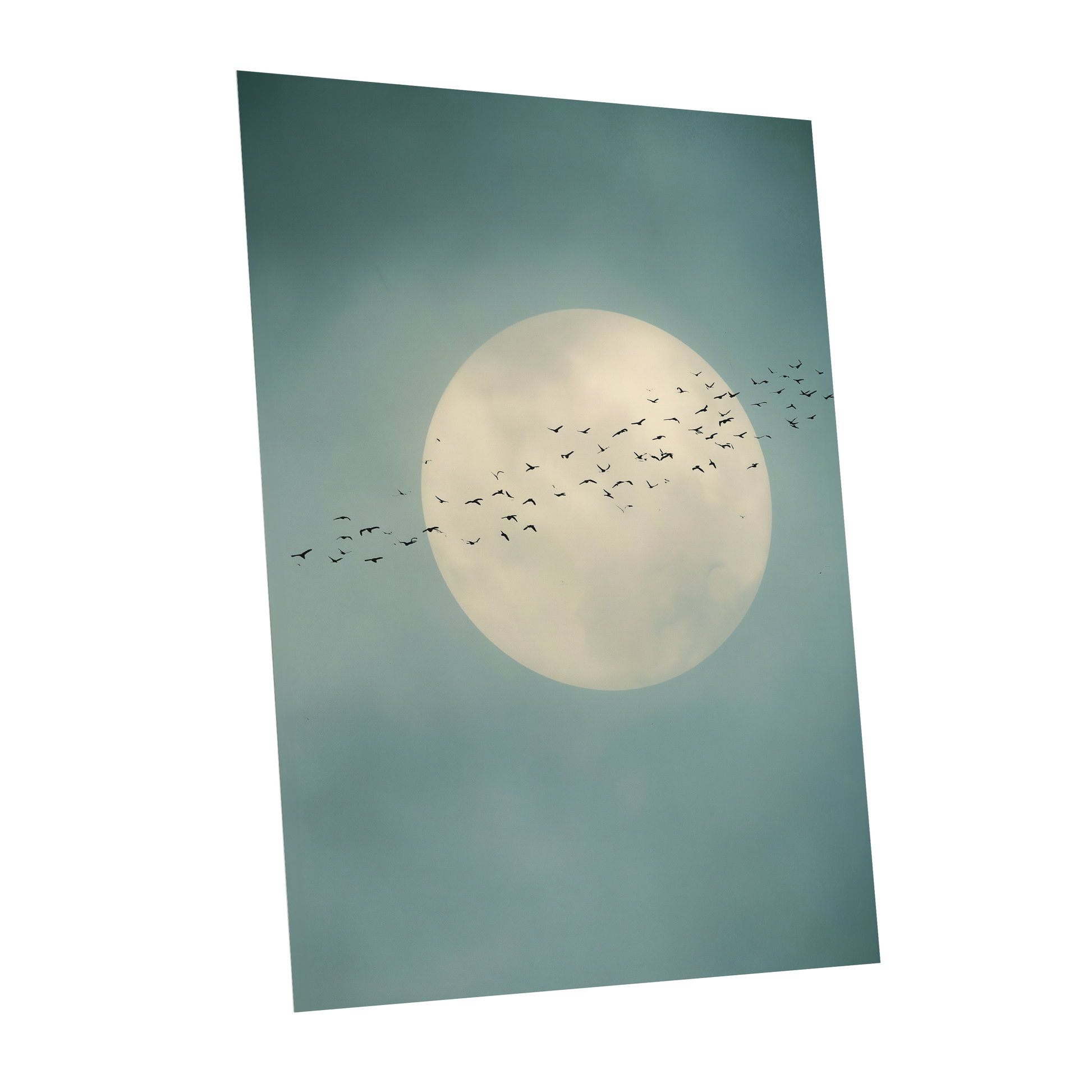 A vertical art print depicting a large cream-colored full moon against a muted teal-blue cloudy sky, with a flock of small black birds flying across the center. The print is shown at a slight angle on a solid white background.