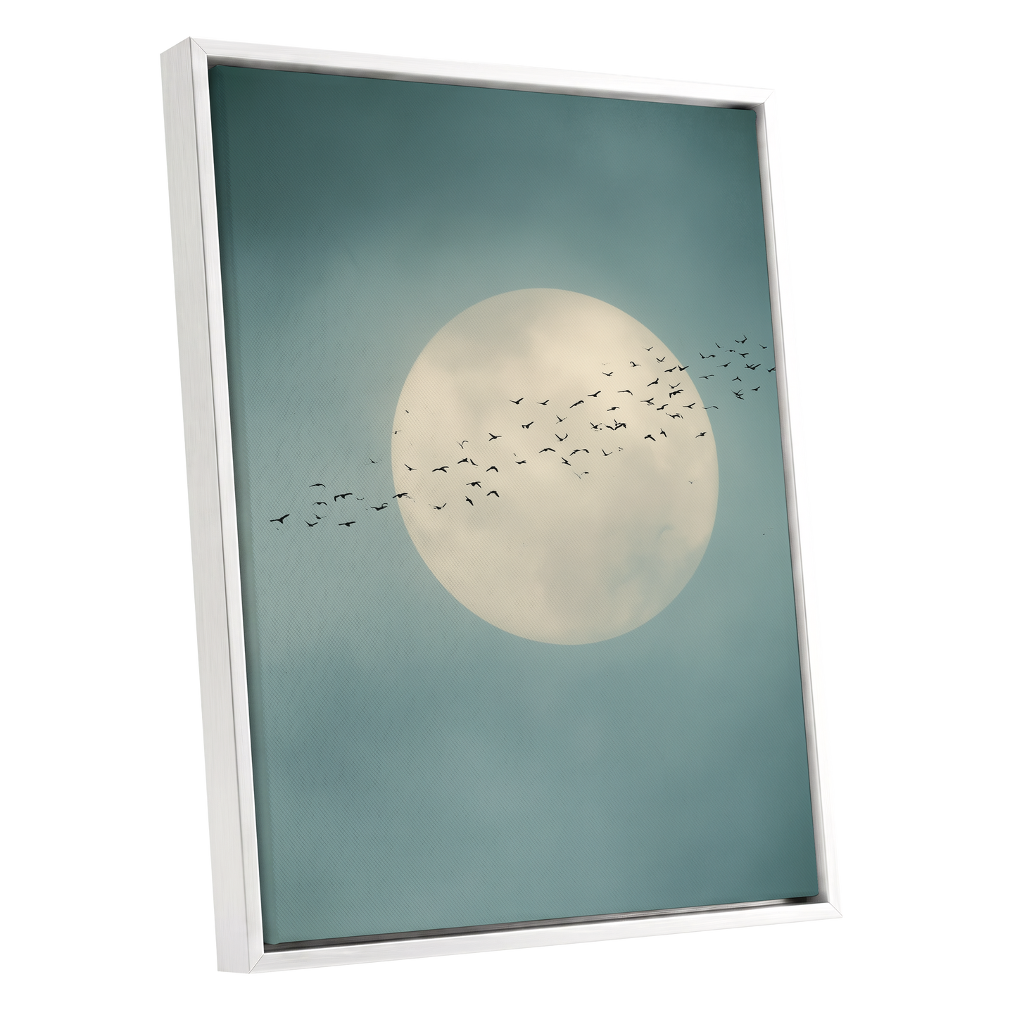 A framed art print featuring a large cream-colored full moon against a muted teal-blue sky, with a flock of small black birds flying across the center. The print is housed in a clean white frame and shown at a slight angle on a solid white background.