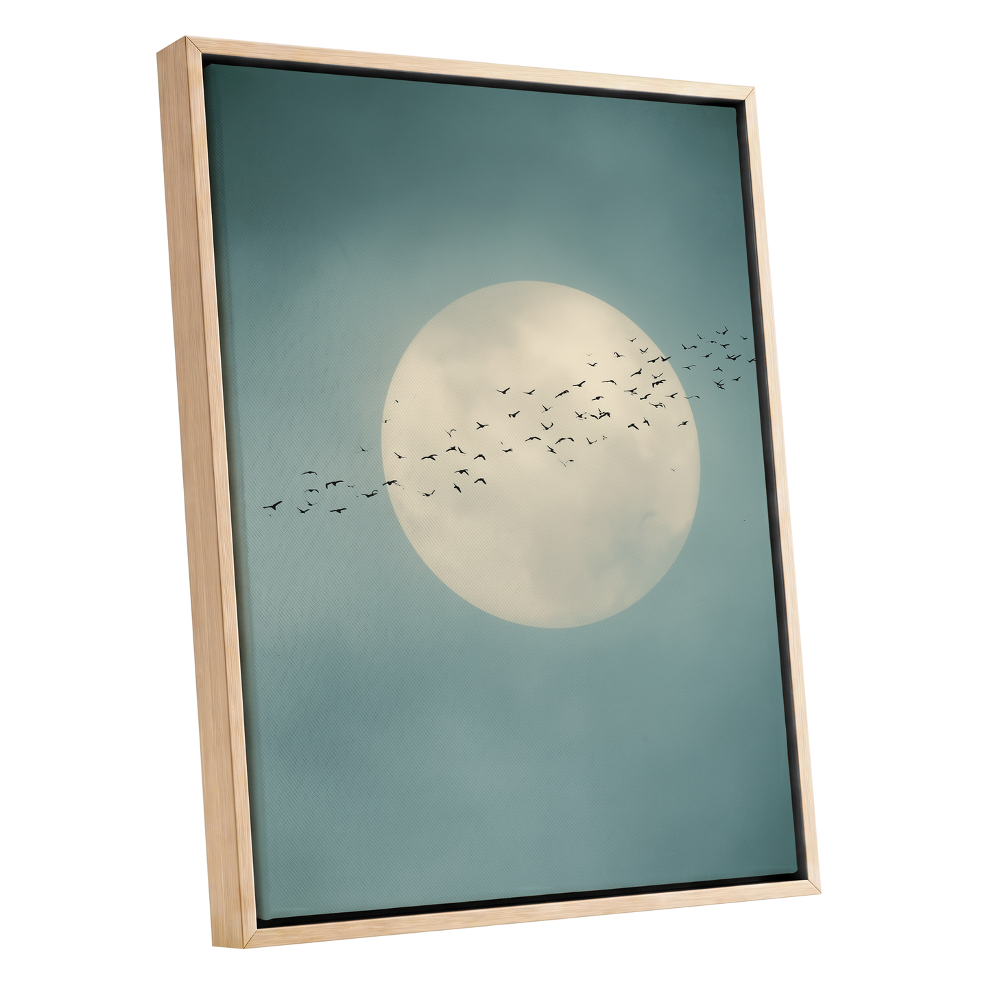 Framed wall art featuring a large cream full moon against a muted teal-blue sky, with a flock of small black birds flying across the center. The artwork is shown in a light natural wood frame on a plain white background.