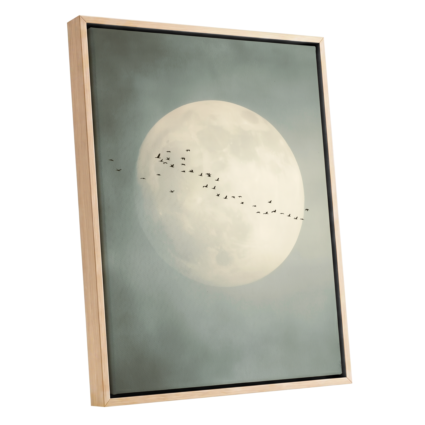 Framed wall art featuring a large pale full moon against a muted gray-green sky, with a line of small birds across the center. The artwork is shown in a light natural wood frame on a plain white background.