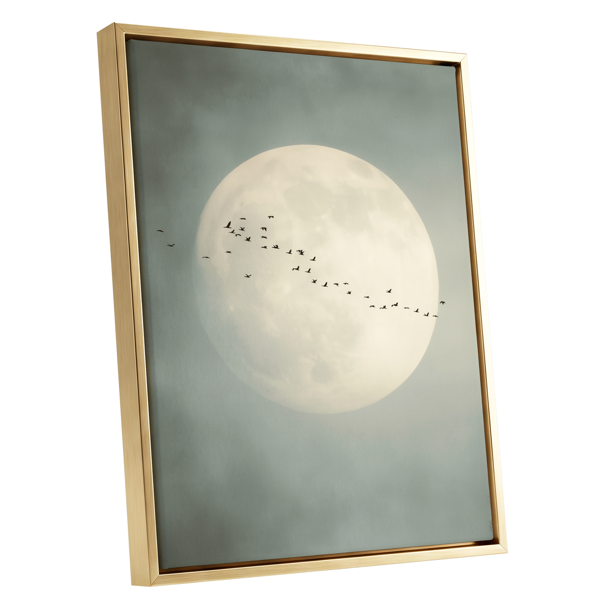 Framed wall art featuring a large pale moon in a misty gray-blue sky with a small flock of birds flying across it, shown in a gold frame on a white background.