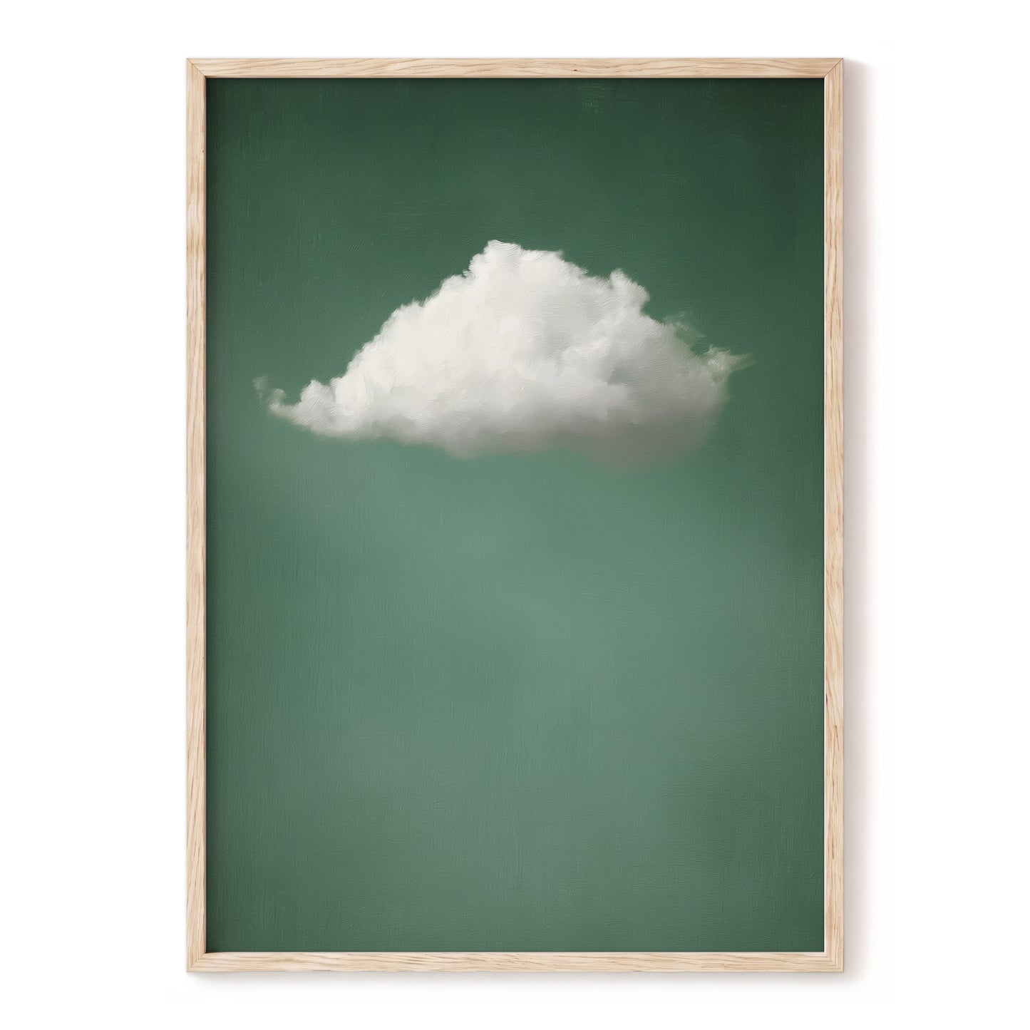Framed wall art featuring a single white cloud against a muted green background, enclosed in a light natural wood frame and shown against a white wall.