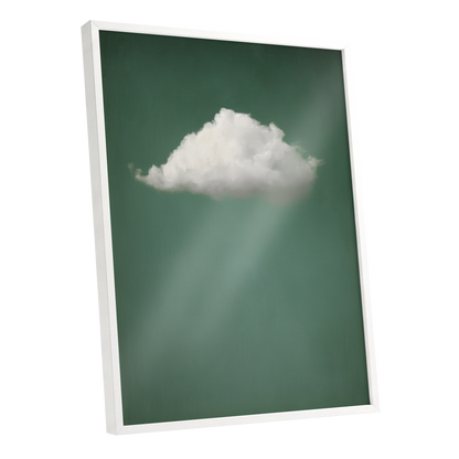 A framed wall art print featuring a white cloud against a dark green background with soft light rays, shown at an angle with a white frame on a light gray background.