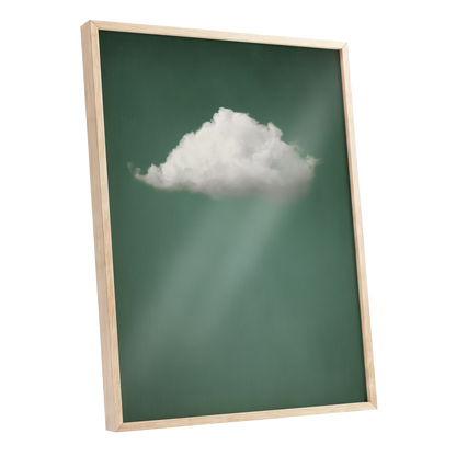 Framed wall art featuring a white cloud over a dark green background with soft light rays, shown in a light natural wood frame against a plain white backdrop.
