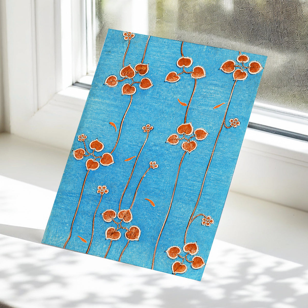 Amber Vine Reverie, blue, orange, brown floral wall art displayed in a styled interior, gallery view 5