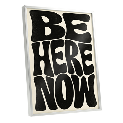 Be Here Now, black, beige minimalist wall art shown as a silver framed poster wall art print