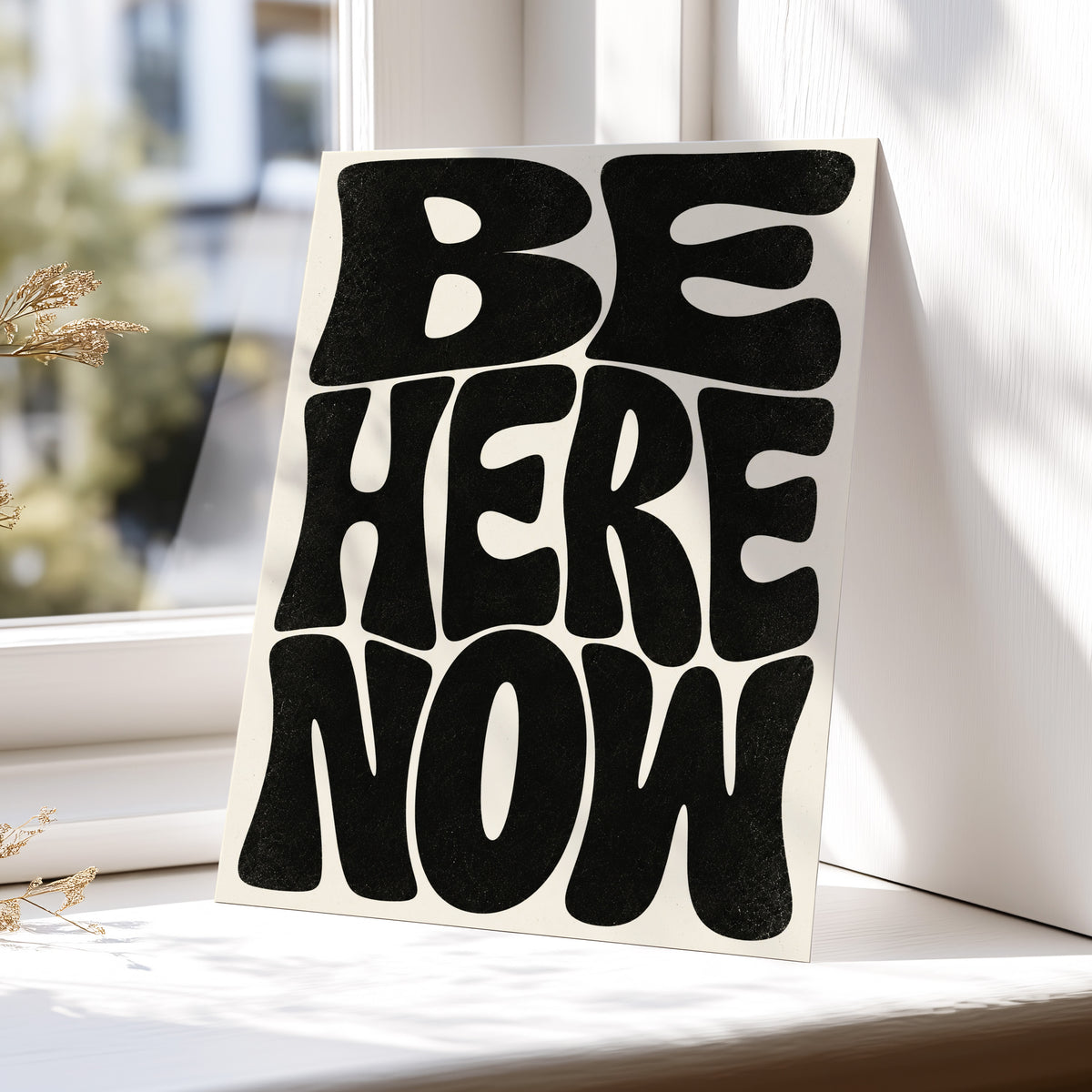 Be Here Now, black, beige minimalist wall art displayed in a styled interior, gallery view 5