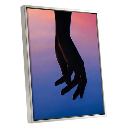 Between Dusk and Blue, black, blue, pink minimalist wall art shown as a silver framed canvas wall art