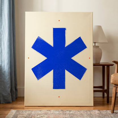 Blue Asterisk Orbit, blue, beige, orange minimalist wall art on canvas displayed in a styled interior, gallery view 1