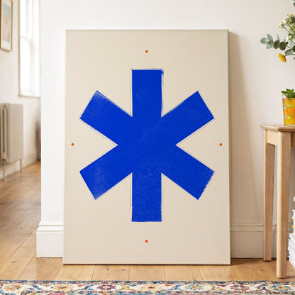 Blue Asterisk Orbit, blue, beige, orange minimalist wall art on canvas displayed in a styled interior, gallery view 2
