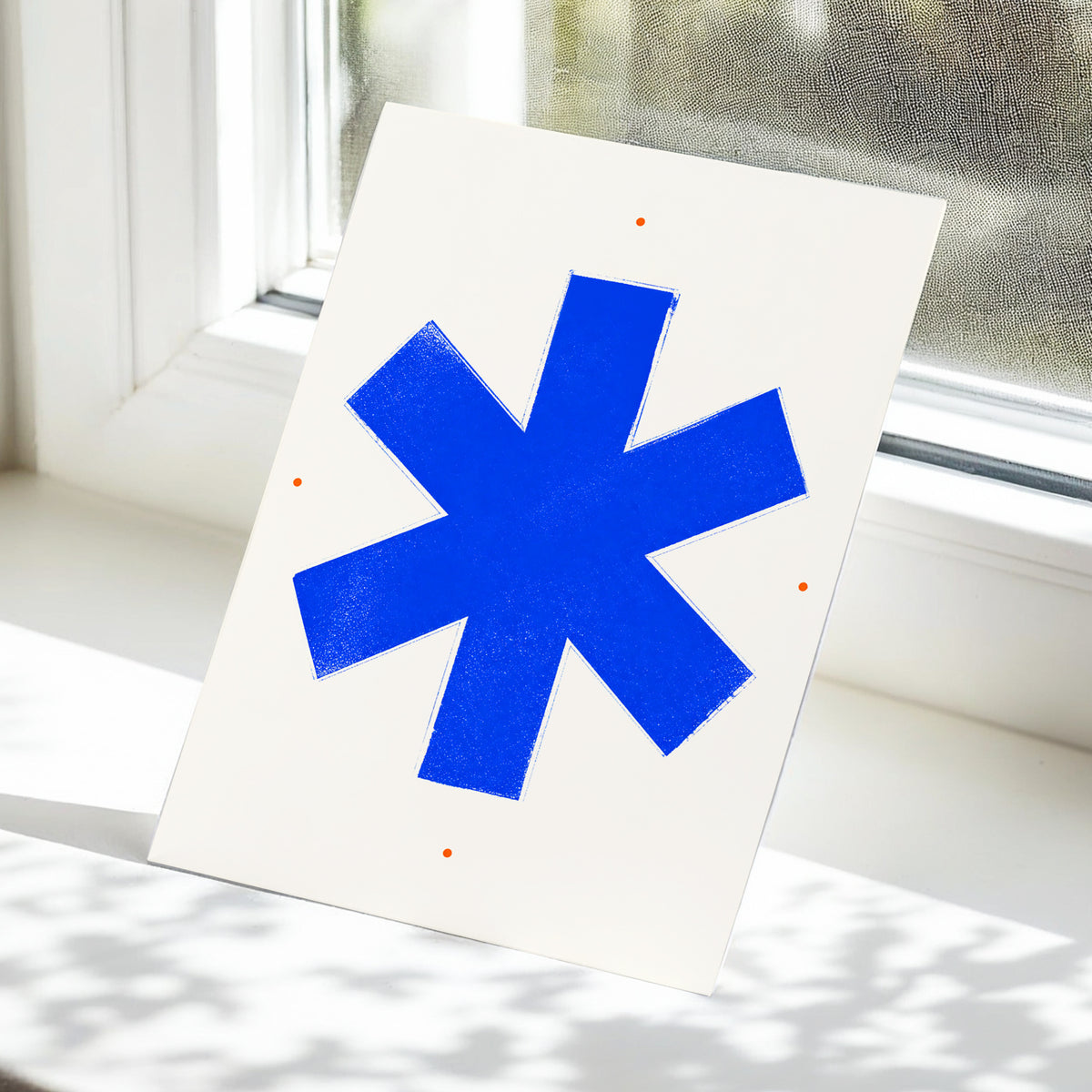 Blue Asterisk Orbit, blue, beige, orange minimalist wall art displayed in a styled interior, gallery view 5
