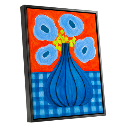 Blue Bloom Carnival, blue, orange, green floral wall art shown as a black framed canvas wall art