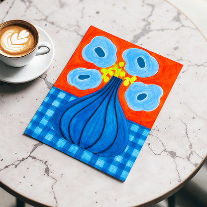 Blue Bloom Carnival, blue, orange, green floral wall art displayed in a styled interior, gallery view 5