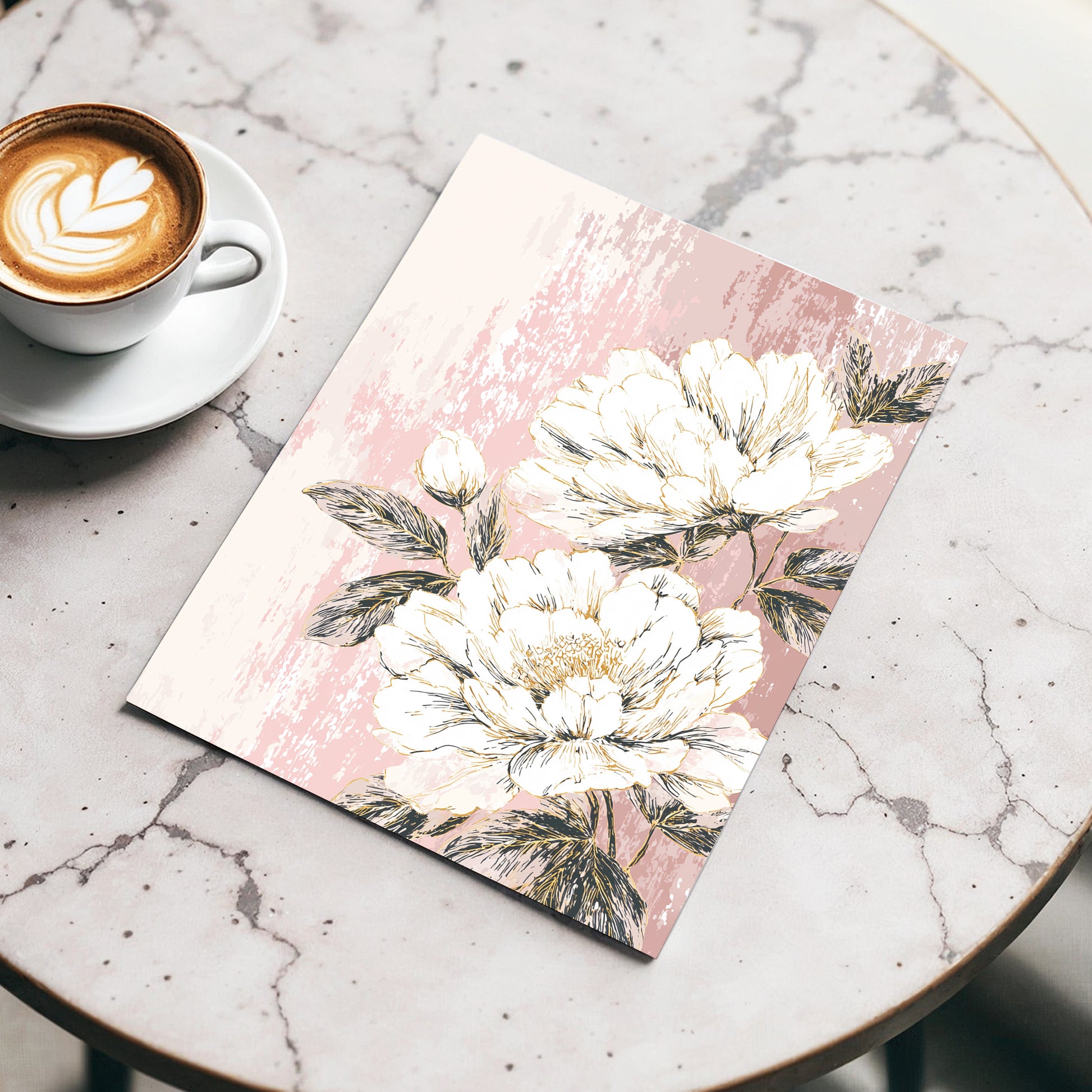 Blush Botanical Bloom: a rectangular art print featuring large white peony flowers on a textured dusty pink background, styled on a round white marble table next to a cup of latte.
