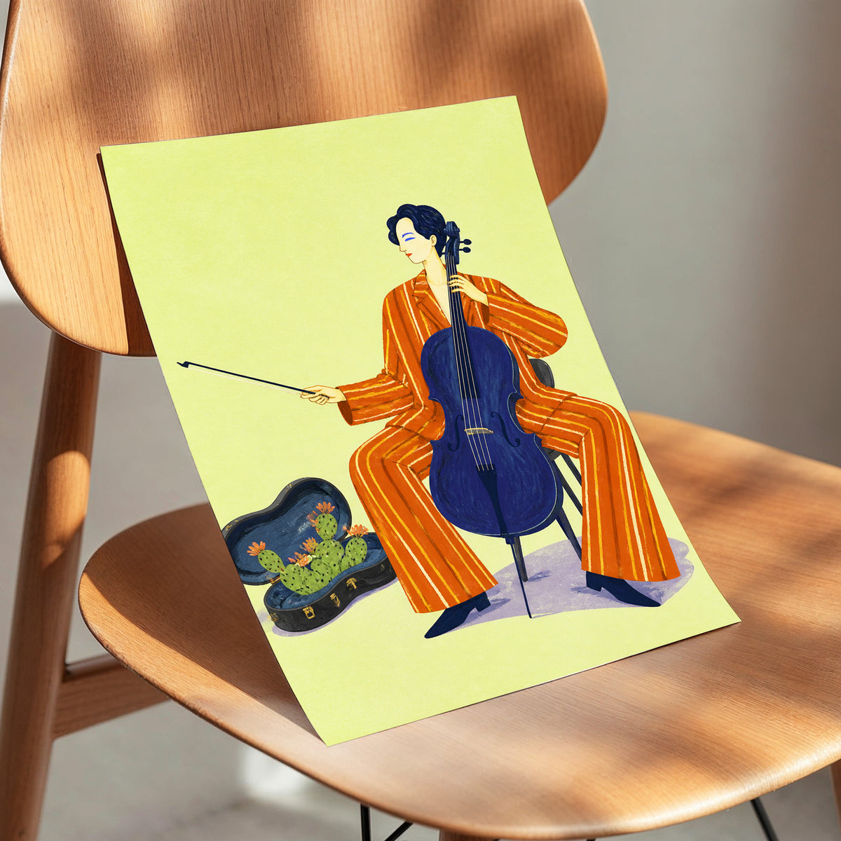 Cello in Citrus, green, orange, blue minimalist wall art displayed in a styled interior, gallery view 5