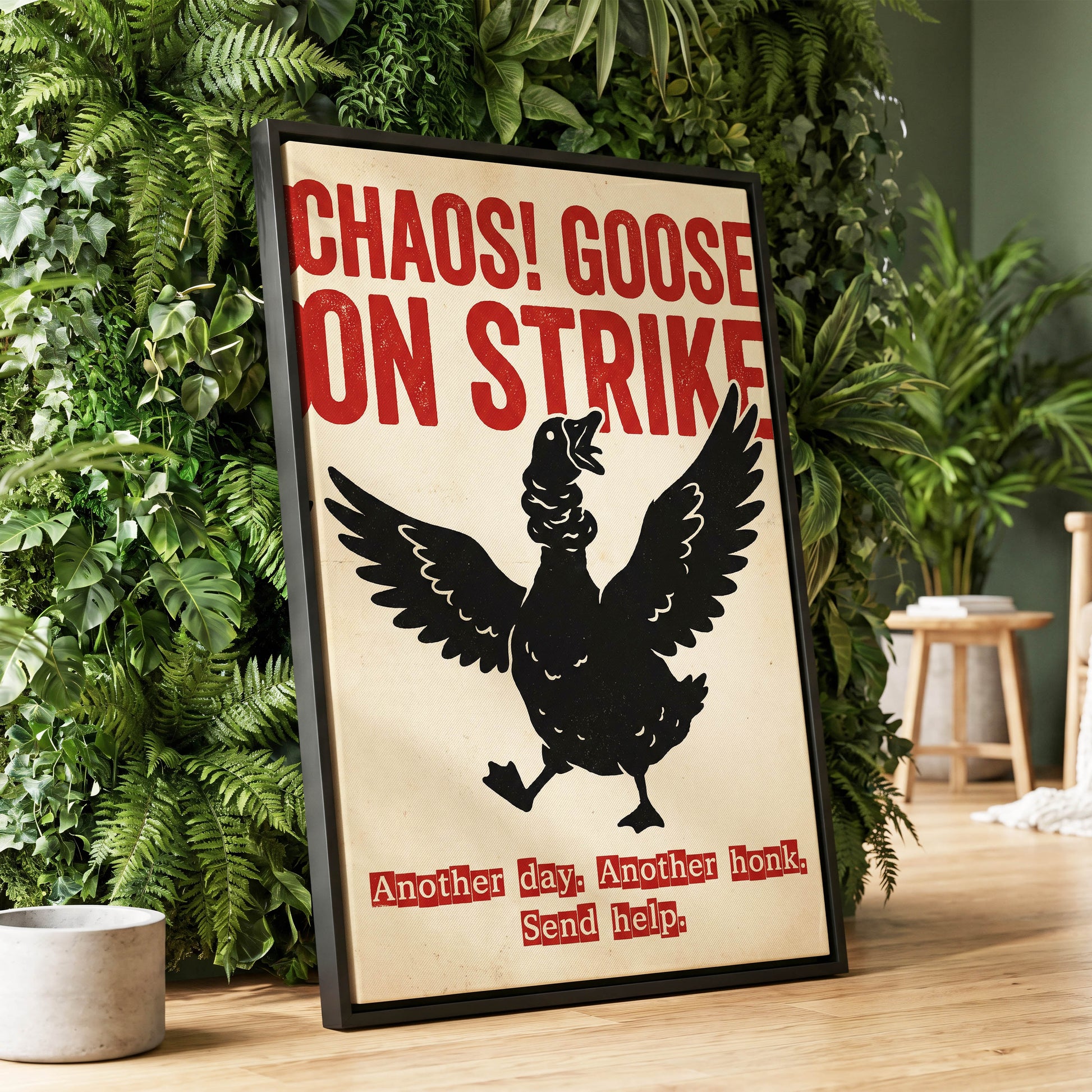 Chaos Goose on Strike, black, beige, red nature wall art displayed in a styled interior, gallery view 1