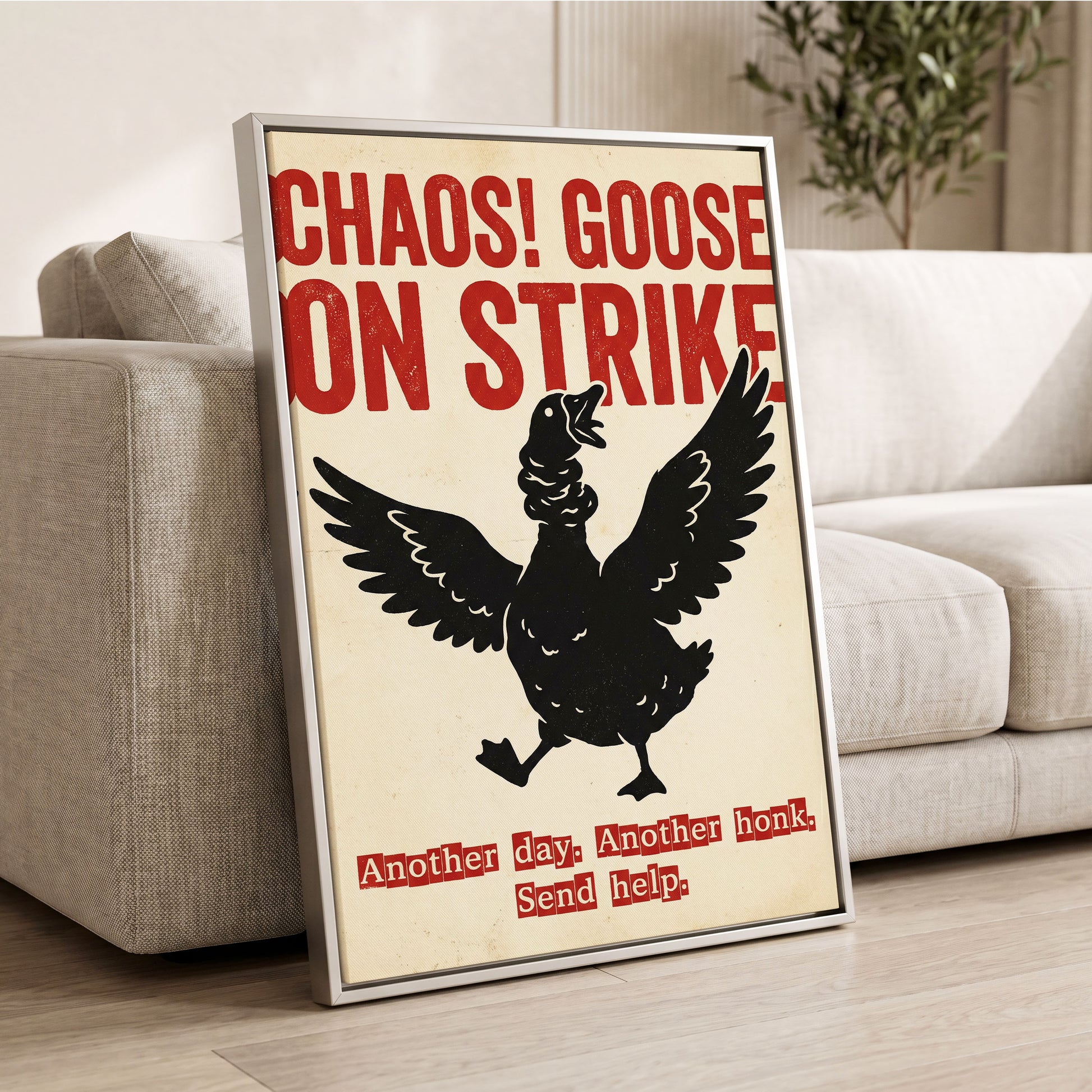 Chaos Goose on Strike, black, beige, red nature wall art displayed in a styled interior, gallery view 2