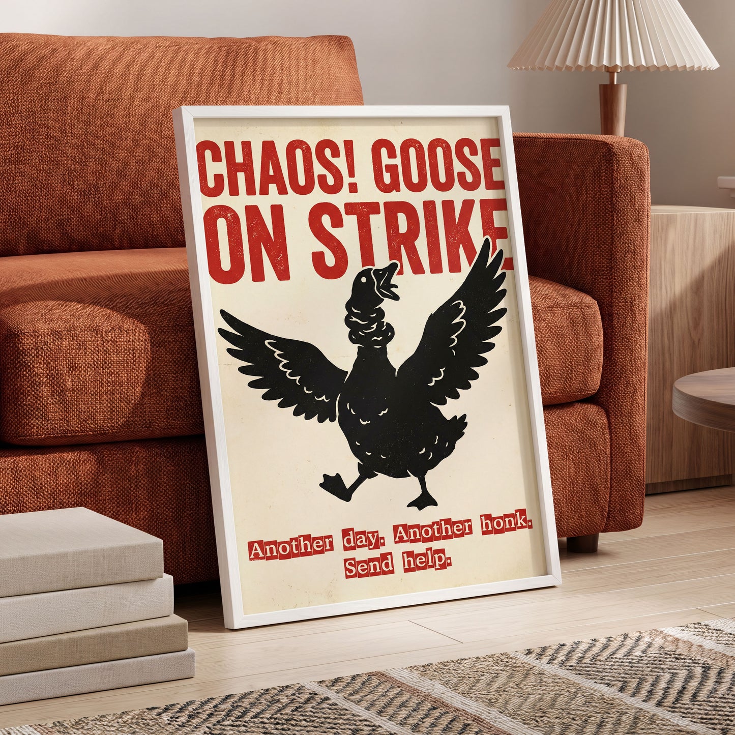 Chaos Goose on Strike, black, beige, red nature wall art displayed in a styled interior, gallery view 6