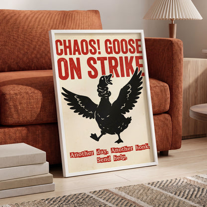 Chaos Goose on Strike, black, beige, red nature wall art displayed in a styled interior, gallery view 6