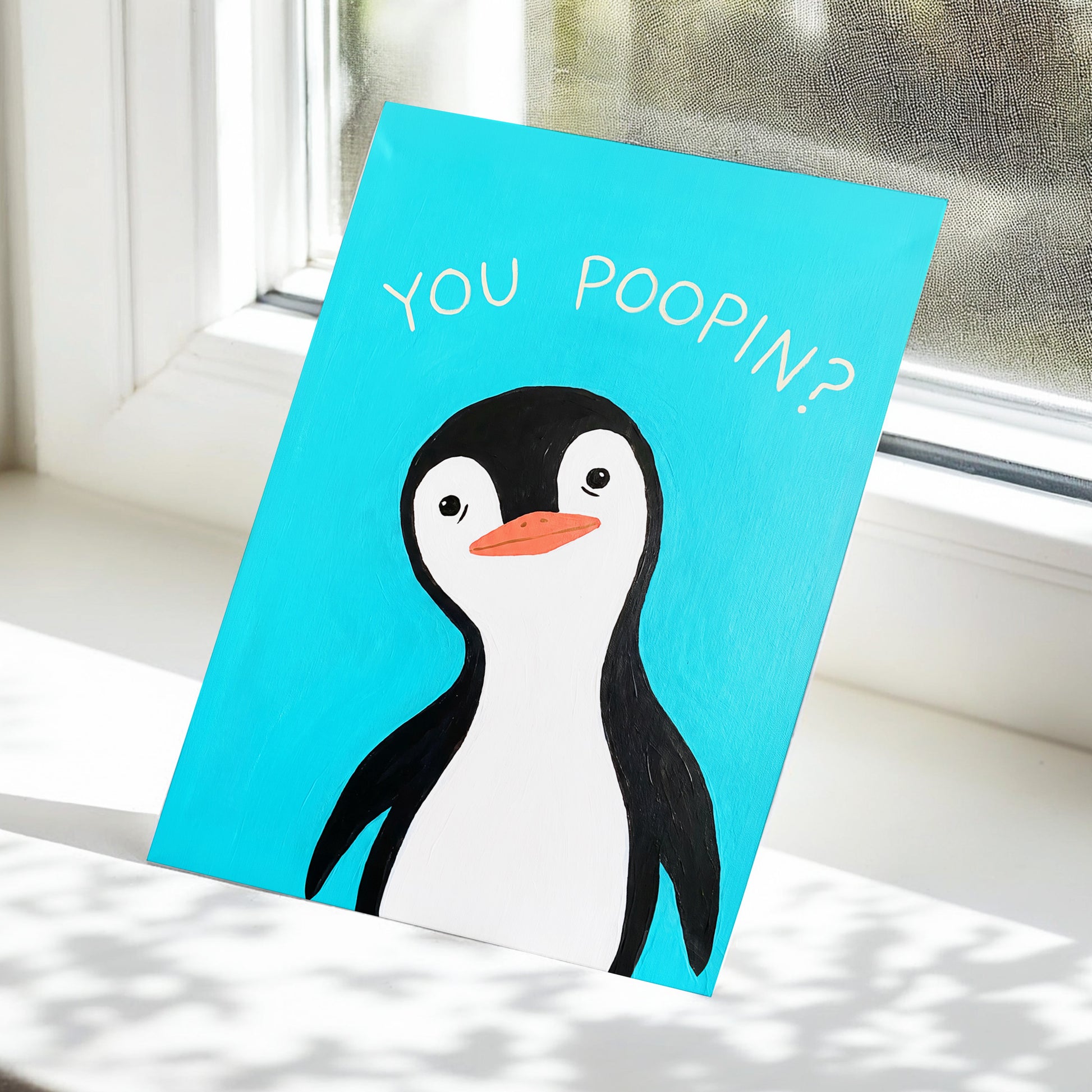 Cheeky Penguin Question, blue, black, white nature wall art displayed in a styled interior, gallery view 5
