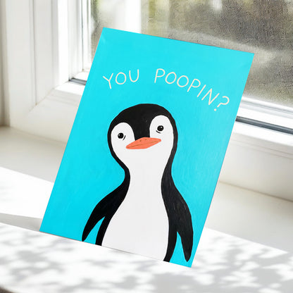 Cheeky Penguin Question, blue, black, white nature wall art displayed in a styled interior, gallery view 5