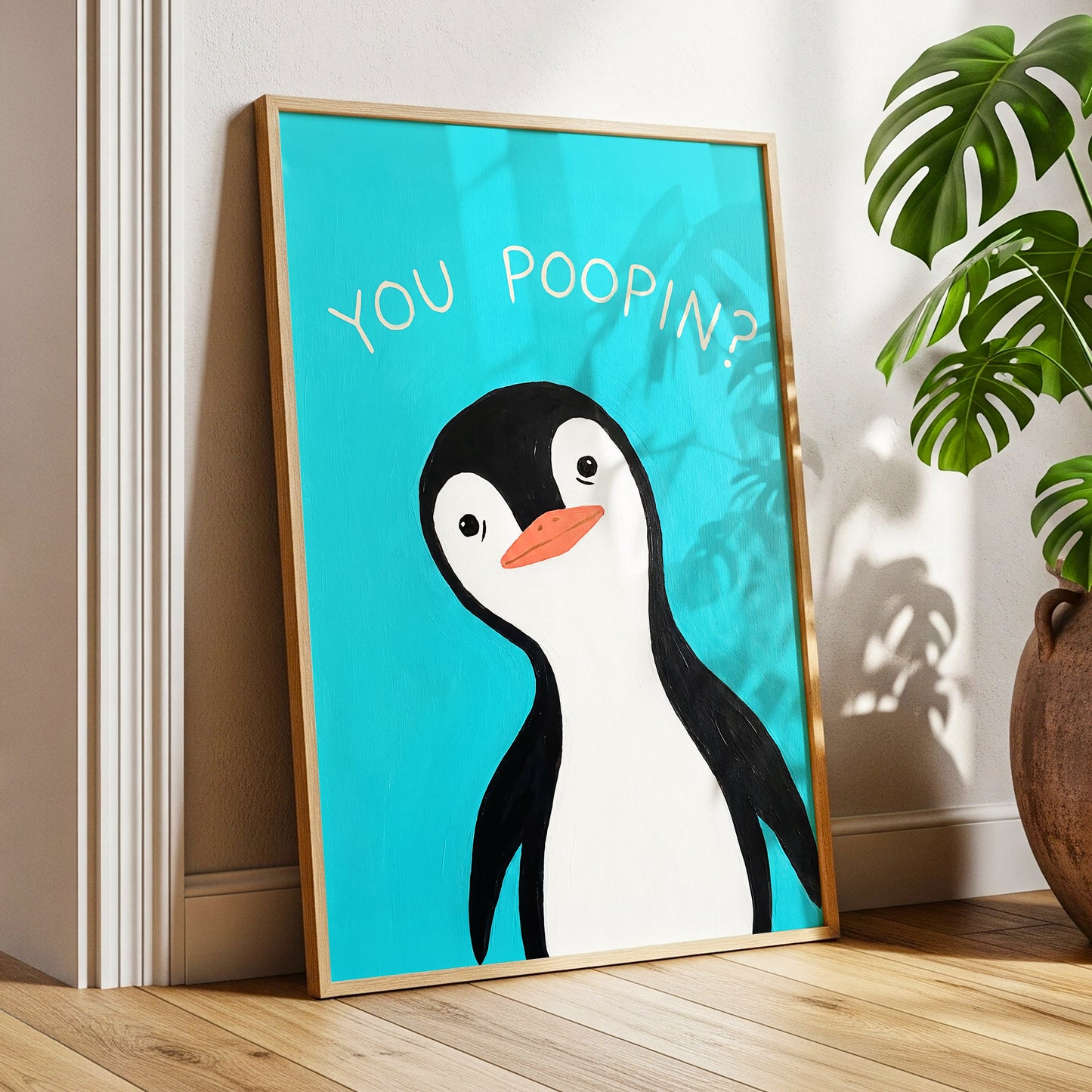 Cheeky Penguin Question, blue, black, white nature wall art displayed in a styled interior, gallery view 6