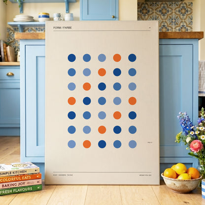 Chromatic Orbit Grid, beige, blue, orange minimalist wall art on canvas displayed in a styled interior, gallery view 2