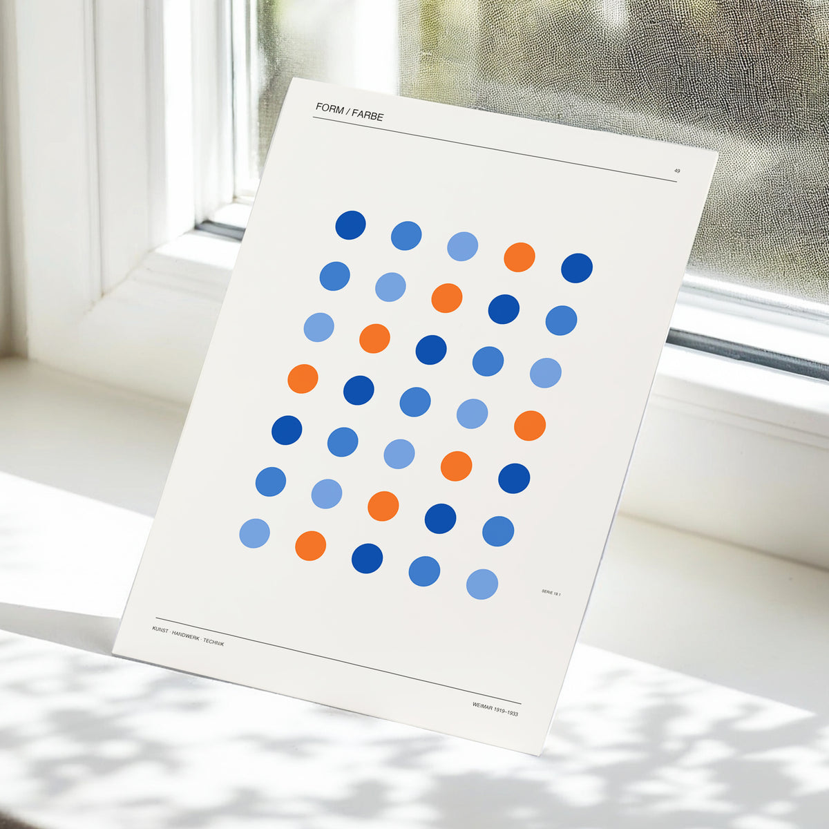 Chromatic Orbit Grid, beige, blue, orange minimalist wall art displayed in a styled interior, gallery view 5