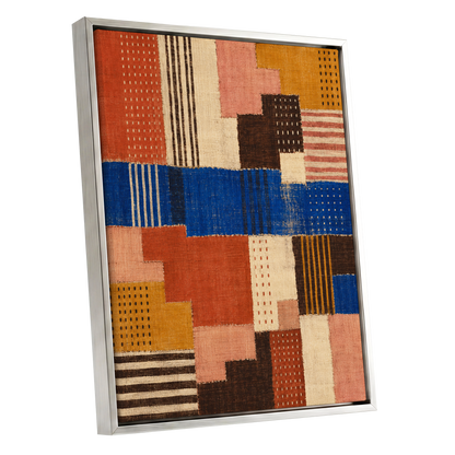 Chromatic Patchwork, blue, orange, beige abstract wall art shown as a silver framed canvas wall art