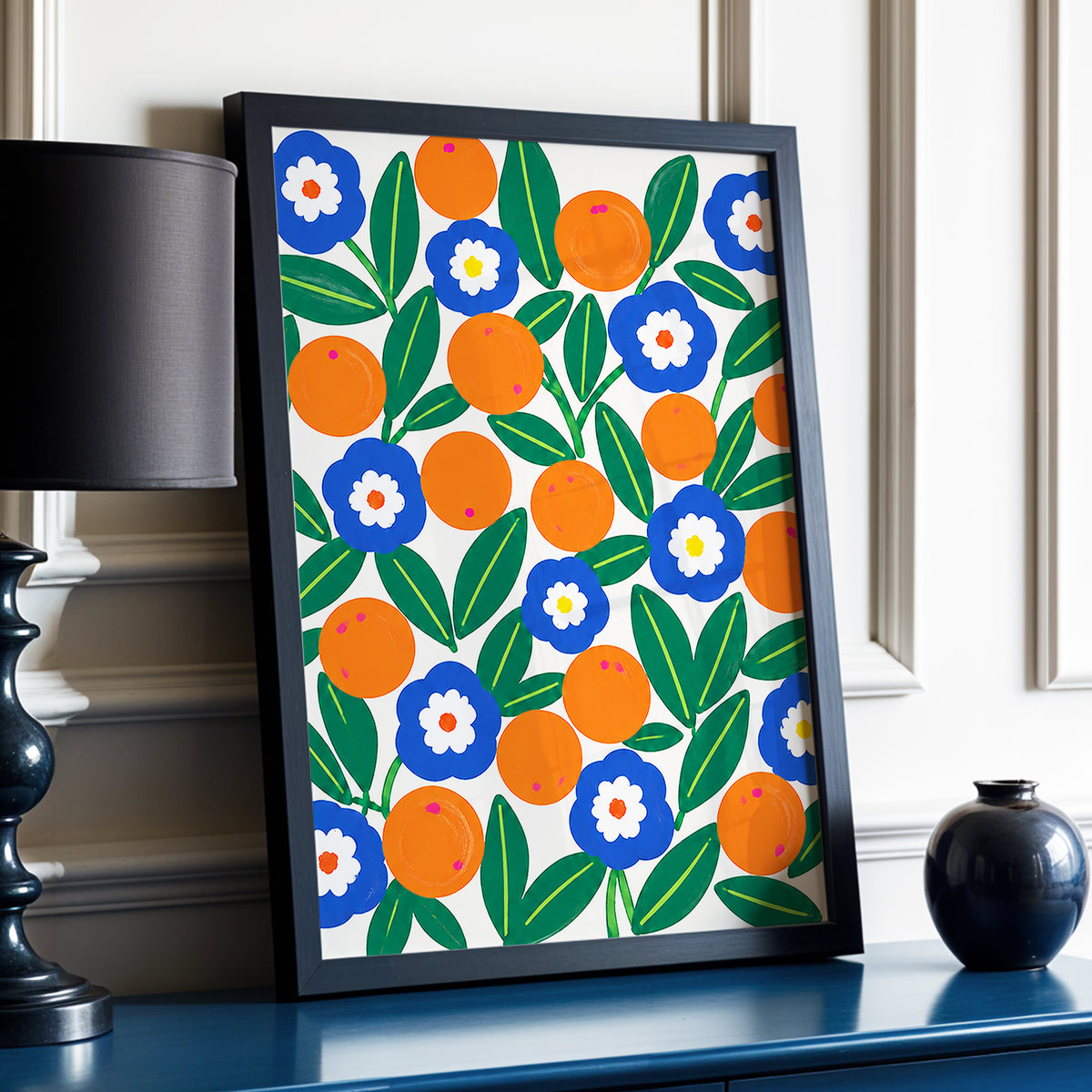Citrus and Cobalt, orange, blue, green floral wall art displayed in a styled interior, gallery view 2