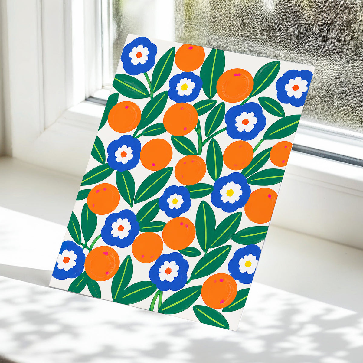 Citrus and Cobalt, orange, blue, green floral wall art displayed in a styled interior, gallery view 5