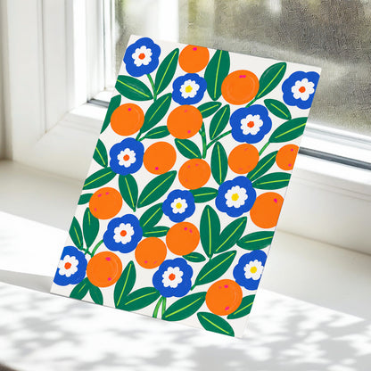 Citrus and Cobalt, orange, blue, green floral wall art displayed in a styled interior, gallery view 5