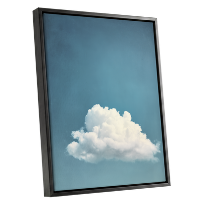 Cloud in Quiet Blue, blue, white, gray nature wall art shown as a black framed canvas wall art