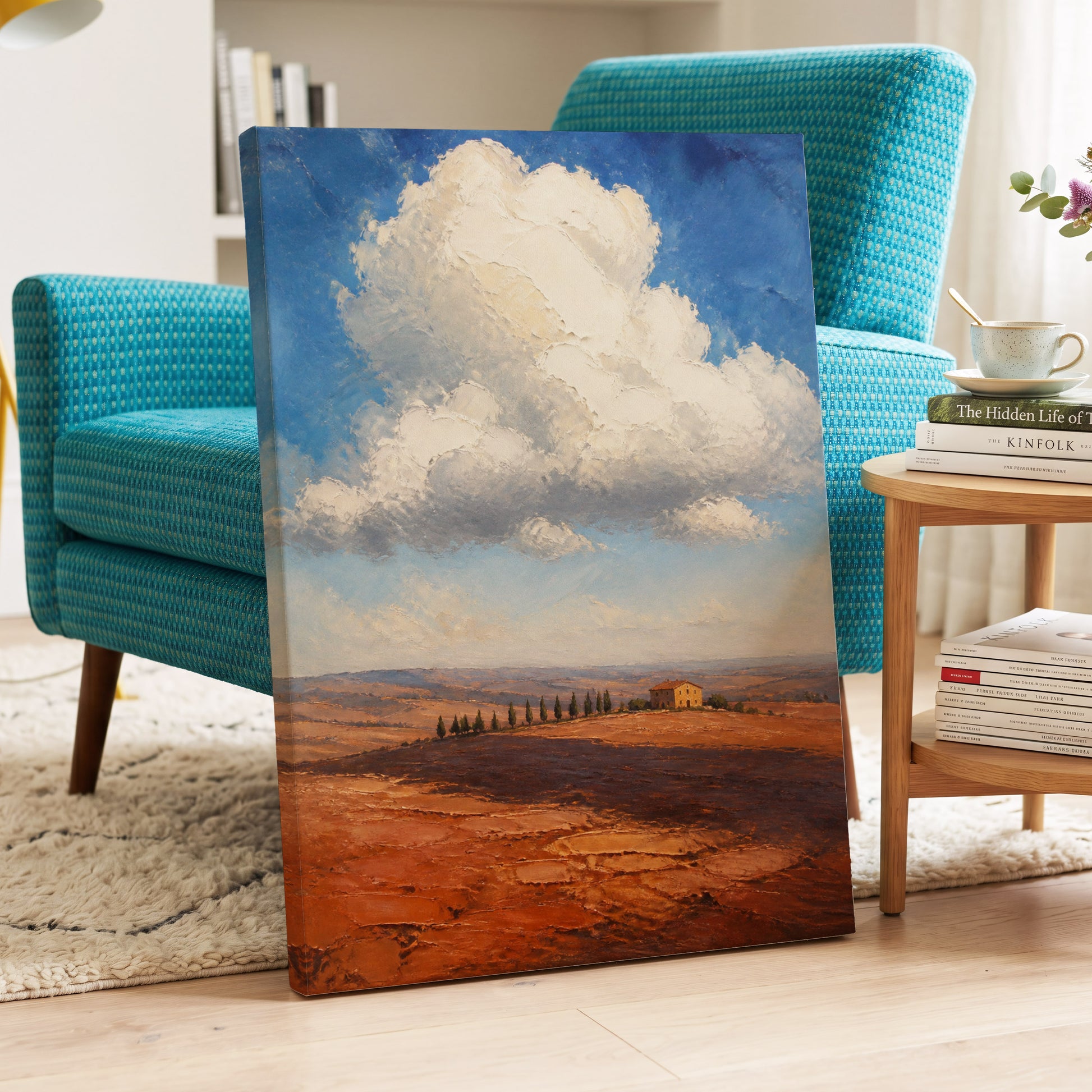 Cloud Over Ochre Fields, blue, white, brown nature wall art on canvas displayed in a styled interior, gallery view 1