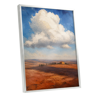 Cloud Over Ochre Fields, blue, white, brown nature wall art shown as a silver framed poster wall art print