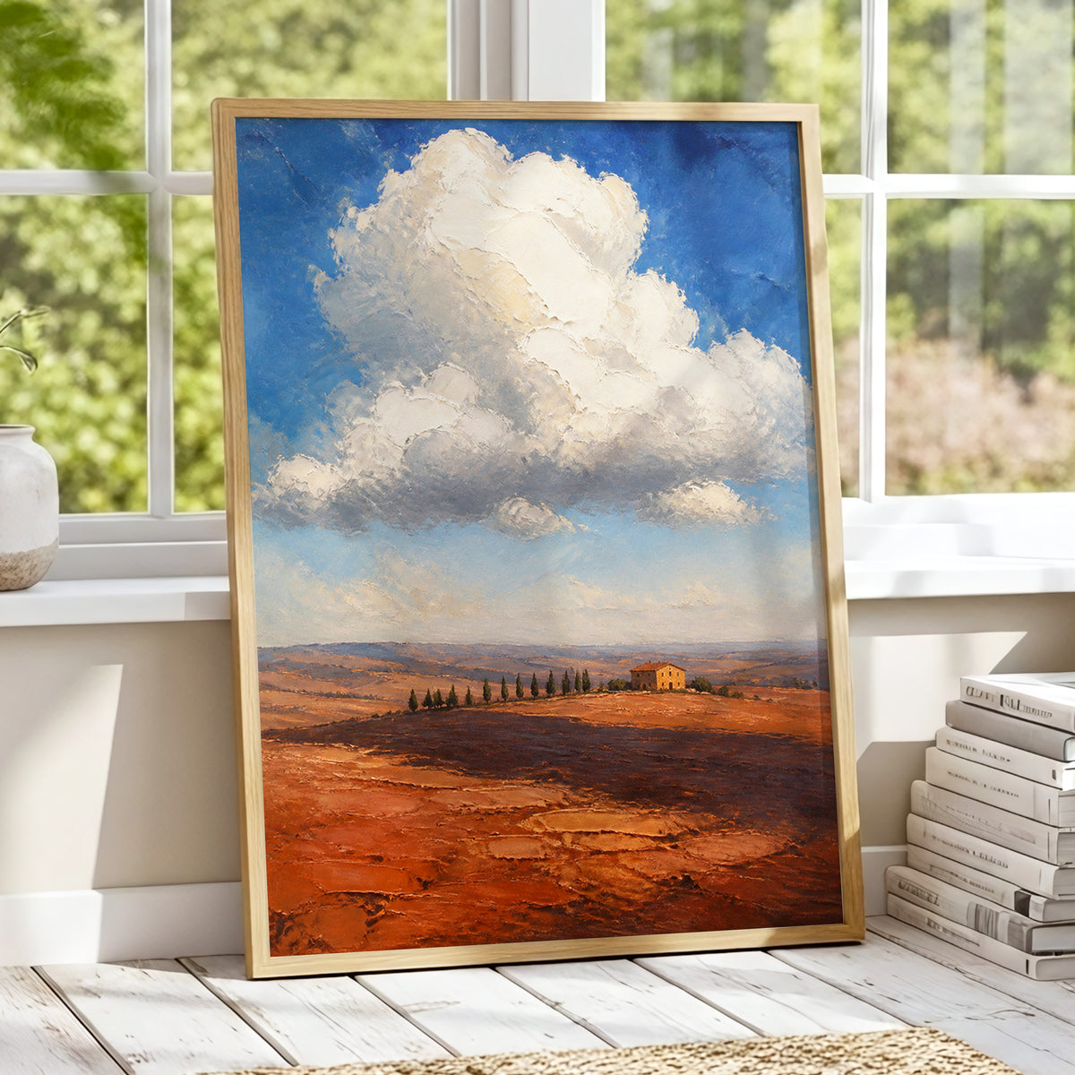 Cloud Over Ochre Fields, blue, white, brown nature wall art displayed in a styled interior, gallery view 1