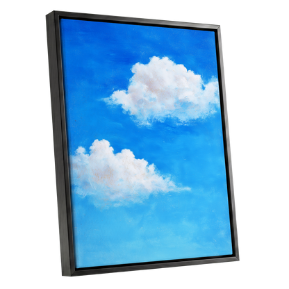 Clouds in Cobalt, blue, white, beige nature wall art shown as a black framed canvas wall art