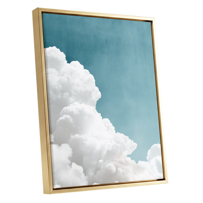 Clouds in Quiet Blue, blue, white, gray nature wall art shown as a gold framed canvas wall art