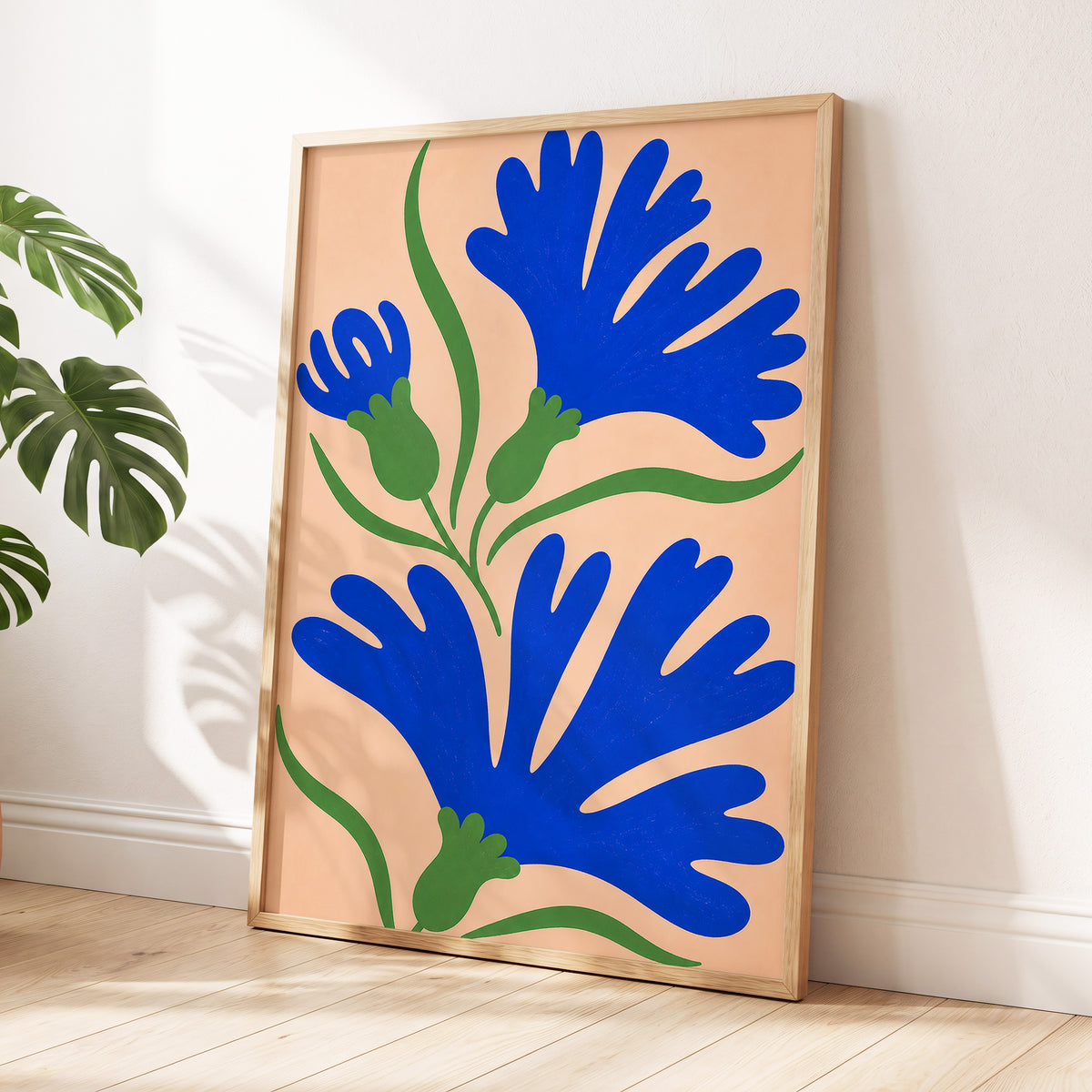 Cobalt Bloom Dance, blue, green, orange floral wall art displayed in a styled interior, gallery view 6