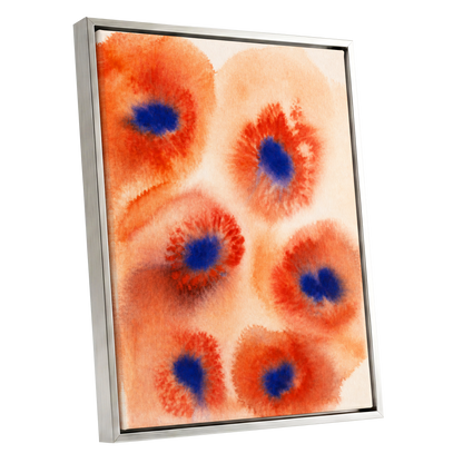 Cobalt Bloom Drift, orange, red, blue floral wall art shown as a silver framed canvas wall art