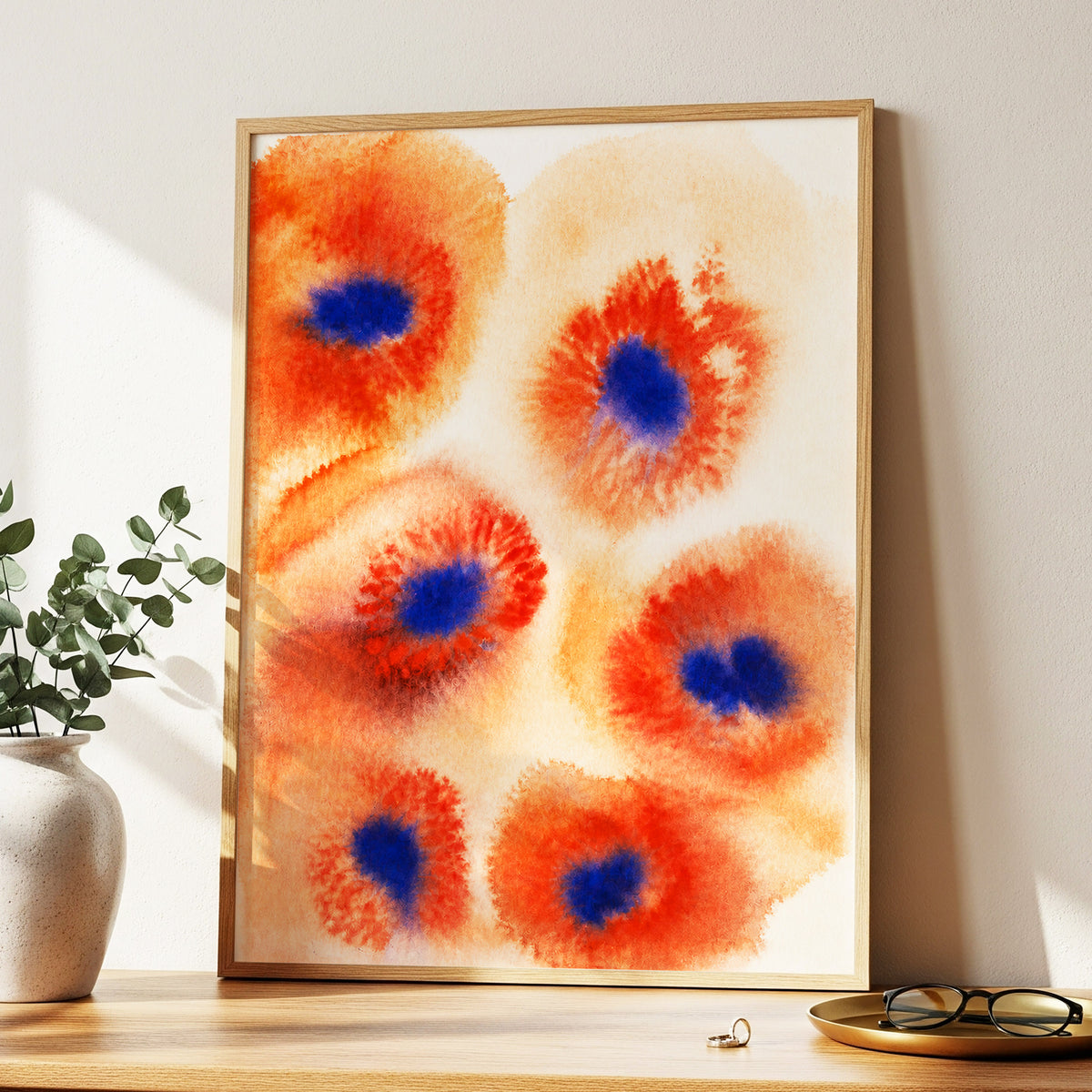 Cobalt Bloom Drift, orange, red, blue floral wall art displayed in a styled interior, gallery view 9