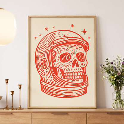 Cosmic Skull Explorer, red, orange, beige minimalist wall art displayed in a styled interior, gallery view 5